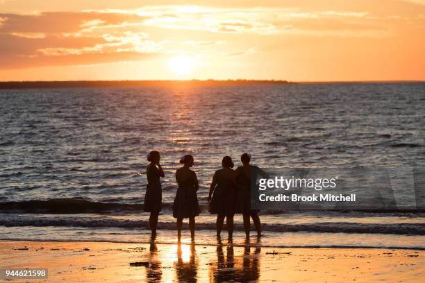 People enjoy the sunset on Mindil Beach on April 8, 2018 in Darwin, Australia. Darwin is the capital of the Northern Territory. It is the smallest...