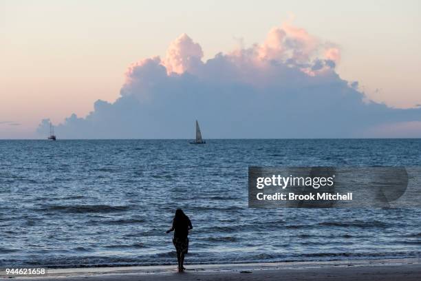 Sunset at Mindil Beach on April 8, 2018 in Darwin, Australia. Darwin is the capital of the Northern Territory. It is the smallest and most northerly...