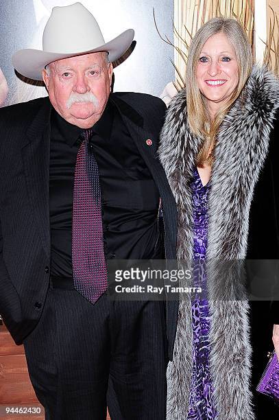 Actor Wilford Brimley and guest attend the "Did You Hear About the Morgans?" New York premiere at Ziegfeld Theatre on December 14, 2009 in New York...