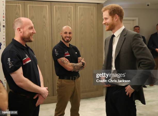 Prince Harry meets participants of the 'Walk Of America' during the launch of the event at Mandarin Oriental Hyde Park on April 11, 2018 in London,...