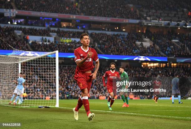 Roberto Firmino of Liverpool celebrates scoring the second goal during the Quarter Final Second Leg match between Manchester City and Liverpool at...