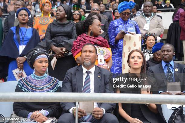 Nelson Mandela's grandson Mandla and his wife Nkosikazi Nosekeni Rabia Mandela and Nodiyala Mbali Makhathini during the official memorial service of...