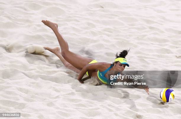 Mariafe Artacho del Solar of Australia dives for a shot during the Beach Volleyball Women's Semi Final match between Australia and Vanuatu on day...
