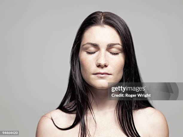 young woman portrait with eyes closed - man closed eyes stock-fotos und bilder