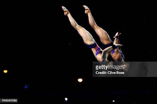 Jun Hoong Cheong and Pandelela Rinong Pamg of Malaysia compete in the Women's Synchronised 10m Platform Diving Final on day seven of the Gold Coast...