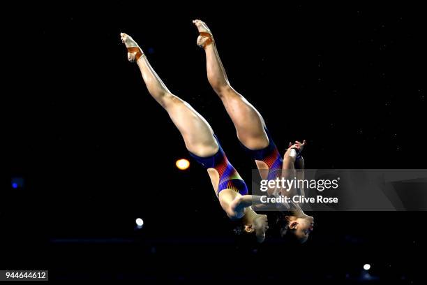 Jun Hoong Cheong and Pandelela Rinong Pamg of Malaysia compete in the Women's Synchronised 10m Platform Diving Final on day seven of the Gold Coast...