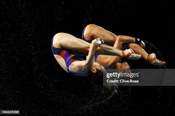 Jun Hoong Cheong and Pandelela Rinong Pamg of Malaysia compete in the Women's Synchronised 10m Platform Diving Final on day seven of the Gold Coast...