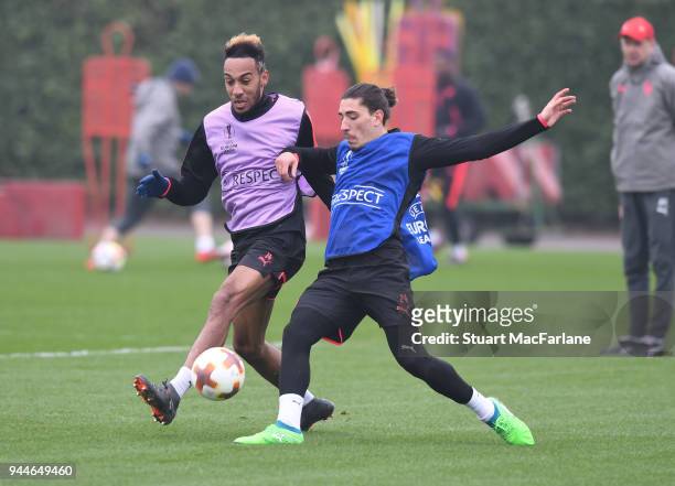 Pierre-Emerick Aubameyang and Hector Bellerin of Arsenal during a training session at London Colney on April 11, 2018 in London, England.