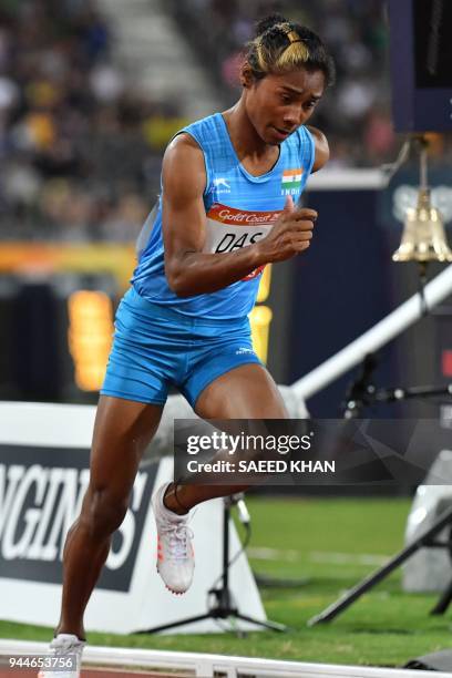 India's Hima Das takes the start of the athletics women's 400m final during the 2018 Gold Coast Commonwealth Games at the Carrara Stadium on the Gold...