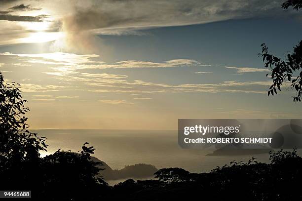 Picture taken on November 23, 2009 shows the granite based mountains of the north west corner of Mahe, the main island in the Seychelles, covered...