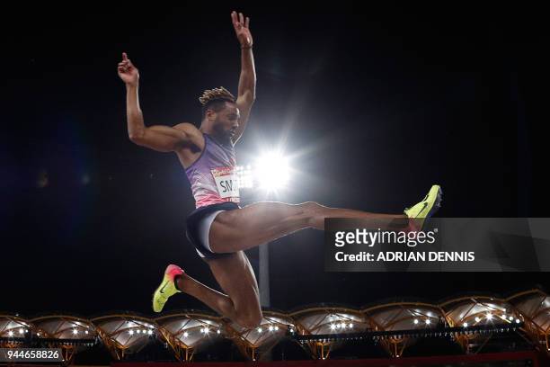 Bermuda's Tyrone Smith competes in the athletics men's long jump final during the 2018 Gold Coast Commonwealth Games at the Carrara Stadium on the...