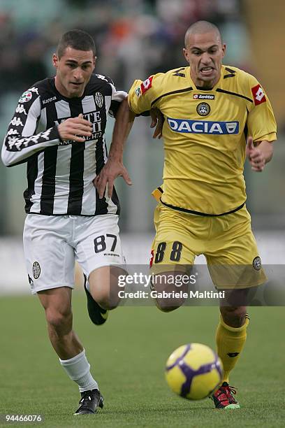 Aleandro Rosi of AC Siena in action against Gokhan Inler of Udinese Calcio during the Serie A match between Siena and Udinese at Artemio Franchi -...