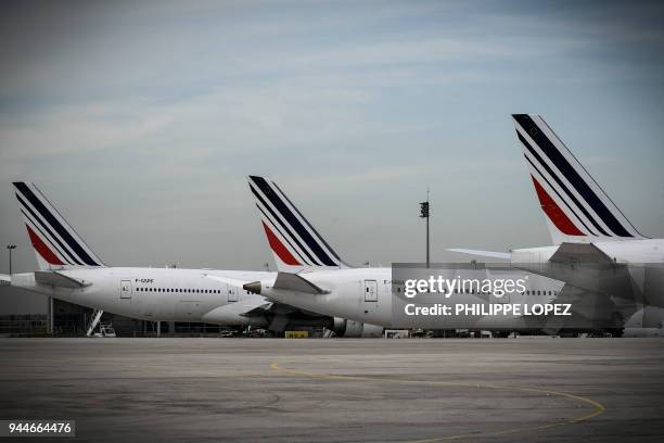 This picture taken on April 11, 2018 shows Air France planes at Paris Charles de Gaulle Airport in Roissy, north of Paris.