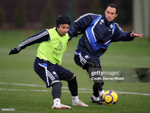 Deco and Ricardo Carvalho of Chelsea during a training session at the Cobham training ground on December 15, 2009 in Cobham, England.