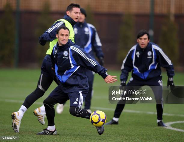 Ricardo Carvalho and Frank Lampard of Chelsea during a training session at the Cobham training ground on December 15, 2009 in Cobham, England.