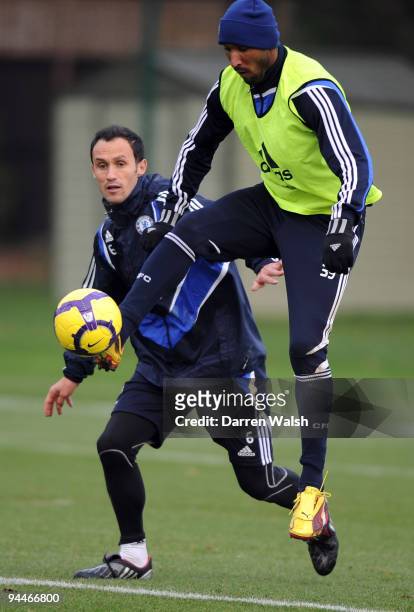Nicolas Anelka and Ricardo Carvalho of Chelsea during a training session at the Cobham training ground on December 15, 2009 in Cobham, England.