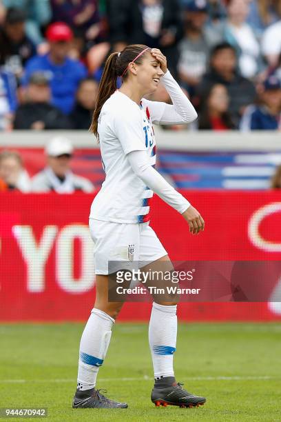 Alex Morgan of United States reacts after missing a shot in the second half against the Mexico at BBVA Compass Stadium on April 8, 2018 in Houston,...