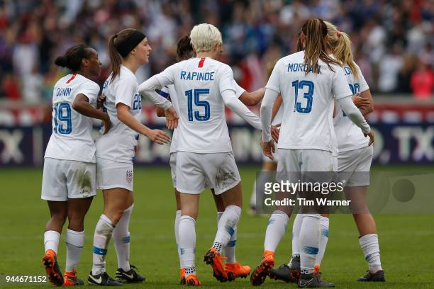 Megan Rapinoe of United States is congratulated by teammates after a goal in the second half against the Mexico at BBVA Compass Stadium on April 8,...