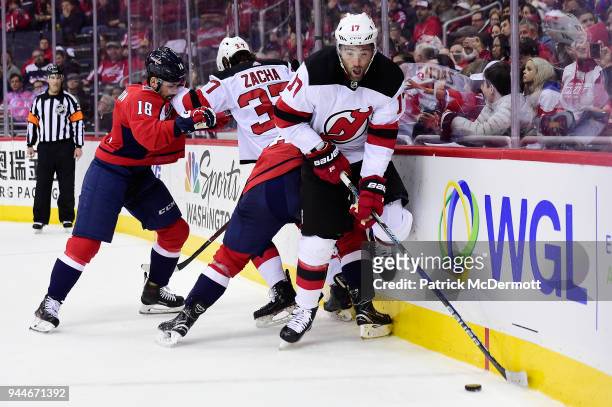 Patrick Maroon of the New Jersey Devils battles for the puck in the second period against the Washington Capitals at Capital One Arena on April 7,...