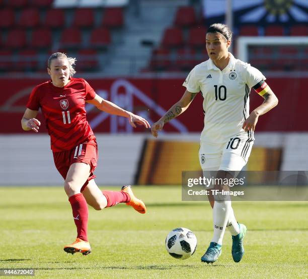 Tereza Krejcirikova of Czech Republic and Dzsenifer Marozsan of Germany battle for the ball during the 2019 FIFA Womens World Championship Qualifier...