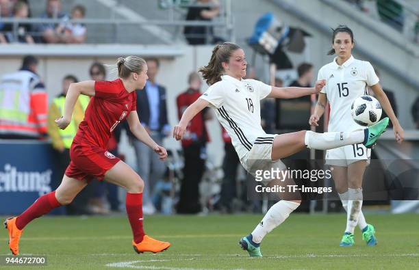 Tereza Krejcirikova of Czech Republic and Melanie Leupolz of Germany and Sara Doorsoun of Germany battle for the ball during the 2019 FIFA Womens...