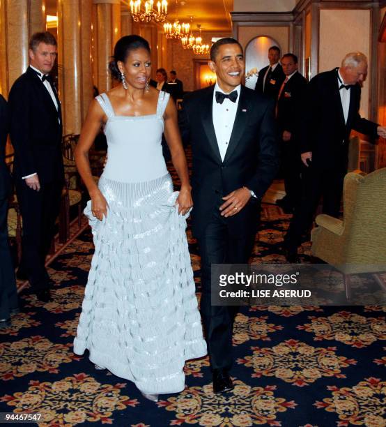 Nobel peace prize laureate, US President Barack Obama and First Lady Michelle Obama arrive to the Nobel Banquet in Oslo on December 10, 2009. US...