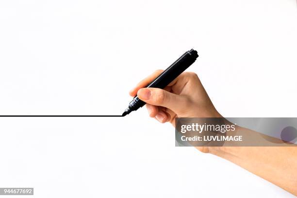 drawing a line. - hand stift stock-fotos und bilder