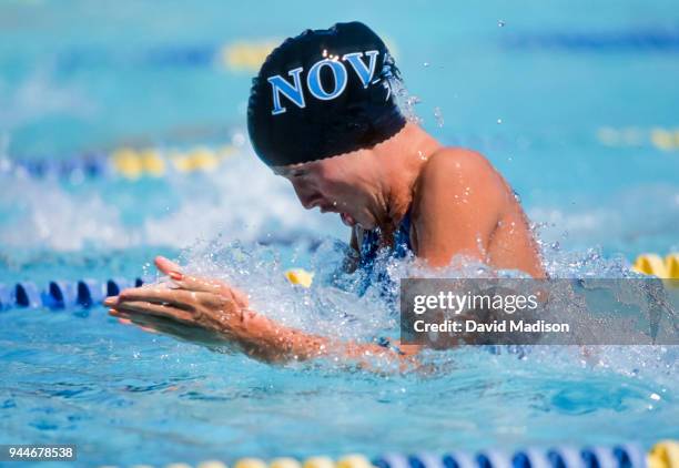 Amanda Beard of the United States and NOVA aquatics club swims a breaststroke event during the Santa Clara International meet held in July 1995 at...