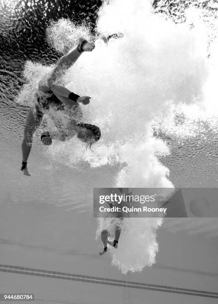 Jun Hoong Cheong and Pandelela Rinong Pamg of Malaysia compete in the Women's Synchronised 10m Platform Diving Final on day seven of the Gold Coast...