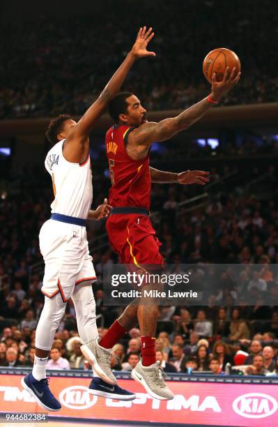 Smith of the Cleveland Cavaliers drives to the basket in the first half against Frank Ntilikina of the New York Knicks at Madison Square Garden on...