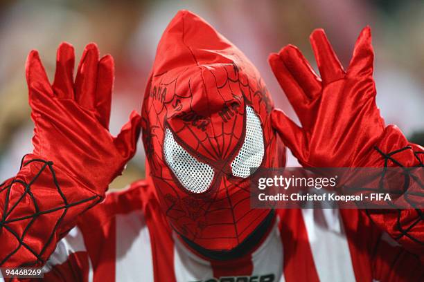 Fan of Estudiantes poses during the FIFA Club World Cup semi-final match between Pohang Steelers and Estudiantes LP at the Mohammed Bin Zayed stadium...