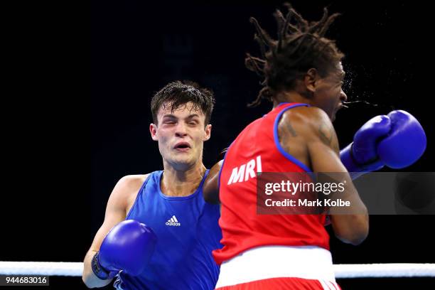 Collin Ritchie Boxing Jean John Collin of Mauritius is punched by James McGivern of... News ...