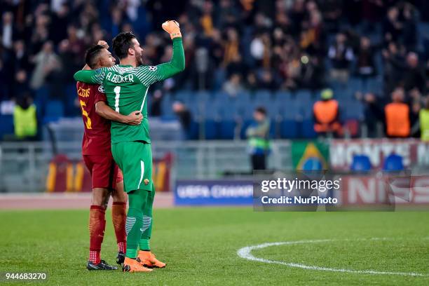 Juan Jesus of Roma celebrates the victory with Allison Becker of Roma after the UEFA Champions League Quarter Final match between Roma and FC...