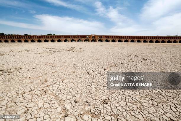 General view shows the "Si-o-Se Pol" bridge over the Zayandeh Rud river in Isfahan, which now runs dry due to water extraction before it reaches the...