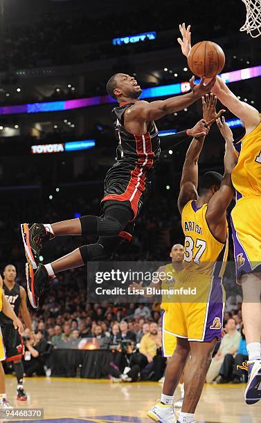 Dwyane Wade of the Miami Heat drives to the basket against the Los Angeles Lakers at Staples Center on December 4, 2009 in Los Angeles, California....