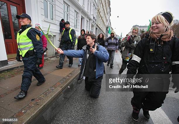 Environmental activists hold a demonstration in the centre of Copenhagen on December 15, 2009 in Denmark World leaders started arriving today to...