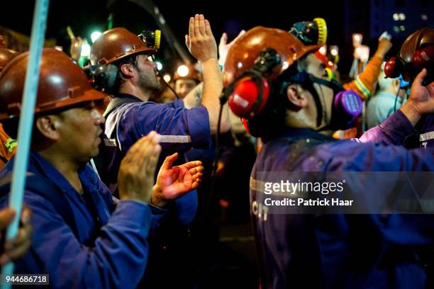 Miners of Fiscal Coal Fields of Rio Rurbio chant during an antorch protest alongside ATE, CTA Autonomous and laid off workes of INTI at National...