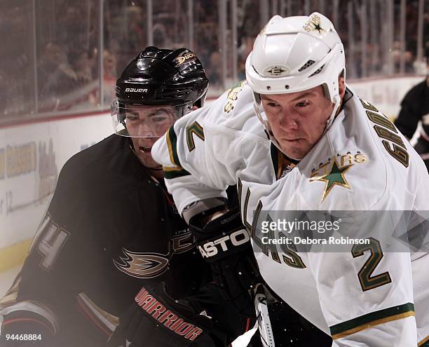 Nicklas Grossman of the Dallas Stars battles against Joffrey Lupul of the Anaheim Ducks during the game on December 8, 2009 at Honda Center in...