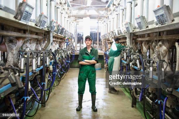 woman worker portrait in the modern farm - female animal stock pictures, royalty-free photos & images