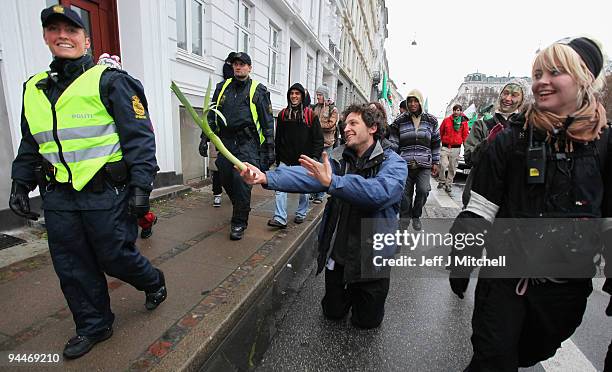 Environmental activists hold a demonstration in the centre of Copenhagen on December 15, 2009 in Denmark World leaders started arriving today to...