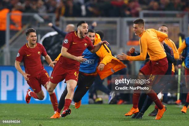 Konstantin Manolas of Roma celebrates with the teamates after the decisive goal scored at Olimpico Stadium in Rome, Italy on April 10 during UEFA...