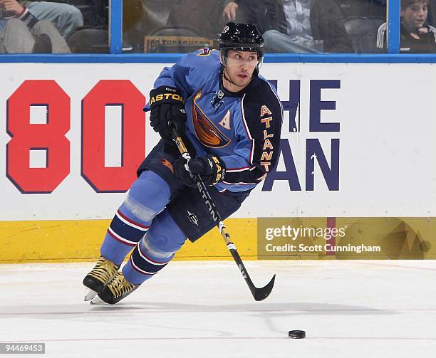 Slava Kozlov of the Atlanta Thrashers carries the puck against the Philadelphia Flyers at Philips Arena on November 28, 2009 in Atlanta, Georgia. The...