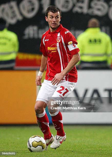 Ovidiu-Nicusor Burca of Cottbus runs with the ball during the Second Bundesliga match between FC Energie Cottbus and FC Hansa Rostock at the Stadion...