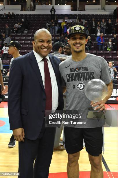 Nick Johnson of the Austin Spurs receives the Most Valuable Trophy from Malcolm Turner after defeating the Raptors 905 to win the NBA G League...