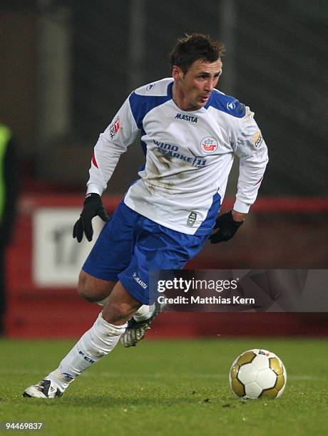 Marcel Schied of Rostock runs with the ball during the Second Bundesliga match between FC Energie Cottbus and FC Hansa Rostock at the Stadion der...