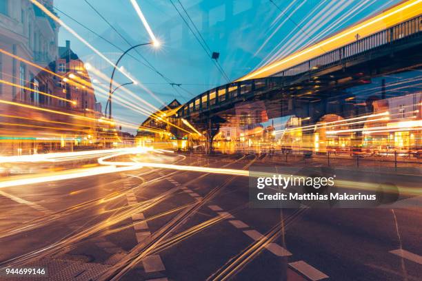 modern creative zoom rush hour night street szene in berlin with traffic lights - car street light stock pictures, royalty-free photos & images