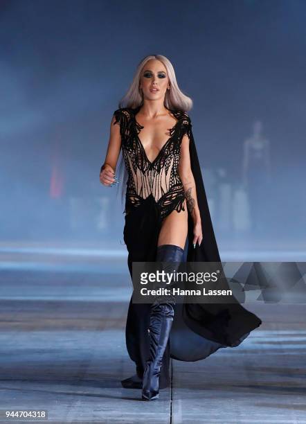 Imogen Anthony showcases designs by Sarah Joseph Couture during the Jurassic World: Fallen Kingdom Runway Show on April 11, 2018 in Sydney, Australia.