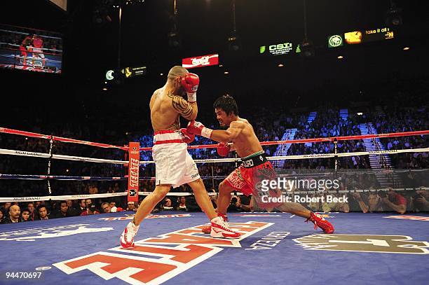 Welterweight Title: Manny Pacquiao in action vs Miguel Cotto during fight at MGM Grand Garden Arena. Las Vegas, NV CREDIT: Robert Beck