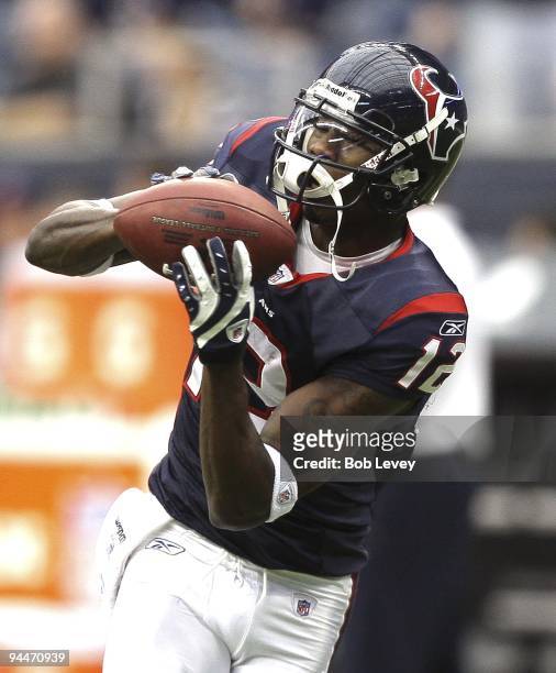 Wide receiver Jacoby Jones of the Houston Texans catches during pre-game warmups before the game against the Seattle Seahawks at Reliant Stadium on...