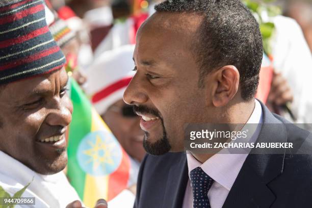 Ethiopia's new Prime Minister Abiy Ahmed attends his rally in Ambo, about 120km west of Addis Ababa, Ethiopia, on April 11, 2018. / AFP PHOTO /...